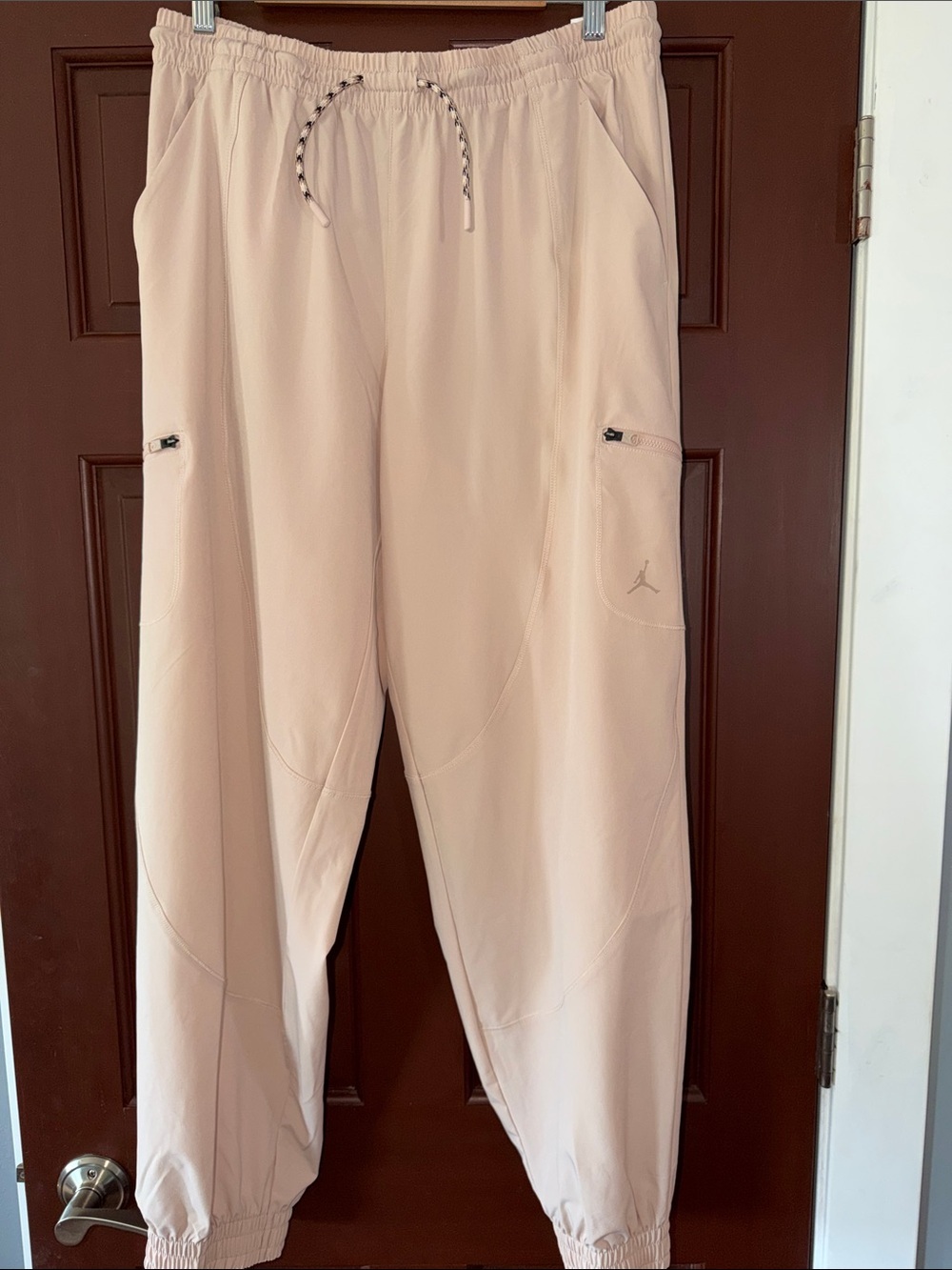 Jordan Women’s  Joggers in Blush/Sand Color.